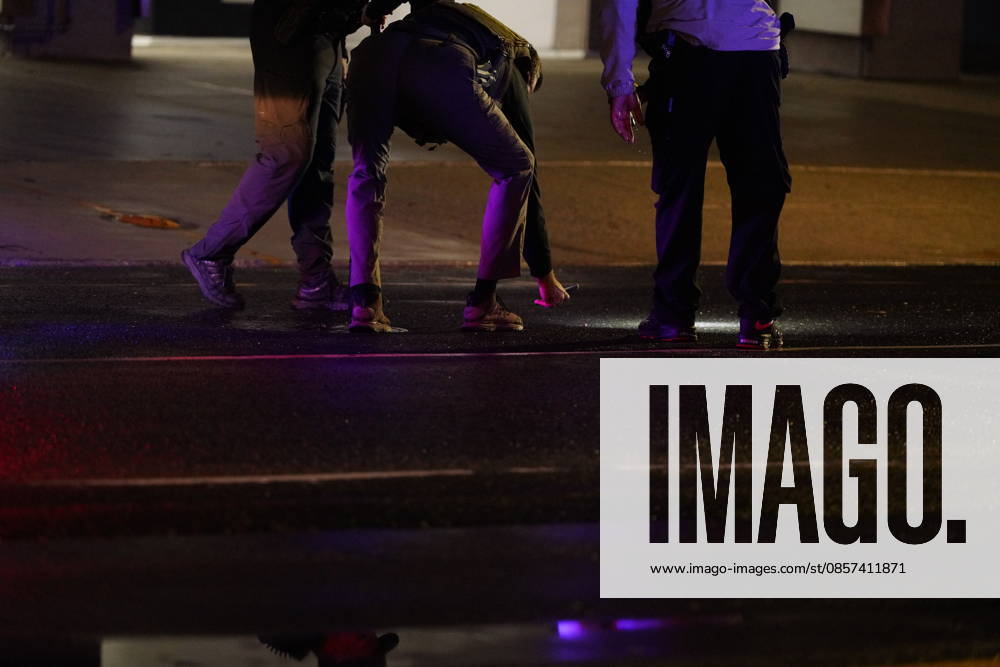 Shots Fired in Vacinity of the White House Police investigators collect evidence in the 1700 block of Pennsylvania Avenue, Northwest, which is one block west of the White House in Washington, DC, USA, following the shooting there on Saturday, May 23, 2026. Two people were shot and taken to a local hospital, one has died. Photo by Andrew Thomas CNP ABACAPRESS.COM Washington District of Columbia United States