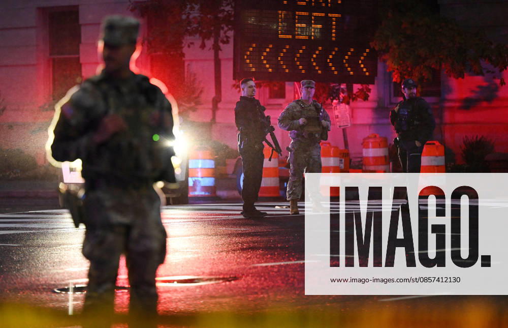 Multiple Shots Fired Half A Block From White House Complex Law enforcement, including members of the National Guard work the scene after multiple rapid-fire gunshots ring out outside the White House on May 23, 2026 in Washington, DC. A suspect was killed after opening fire on a Secret Service checkpoint outside the White House Saturday evening. Photo by Olivier Douliery ABACAPRESS.COM Washington DC United States