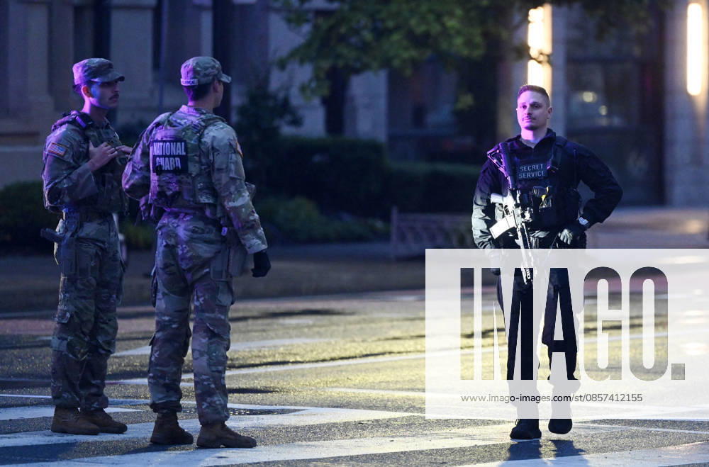 Multiple Shots Fired Half A Block From White House Complex Law enforcement, including members of the National Guard work the scene after multiple rapid-fire gunshots ring out outside the White House on May 23, 2026 in Washington, DC. A suspect was killed after opening fire on a Secret Service checkpoint outside the White House Saturday evening. Photo by Olivier Douliery ABACAPRESS.COM Washington DC United States