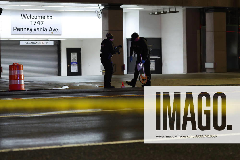 WASHINGTON, D.C. MAY 23: Police Officers investigate after shots were fired after a suspect approached a security checkpoint near the White House and began firing at officers and later died at a hospital near by after being shot by Secret Service officers on May 23, 2026 in Washington, D.C.
