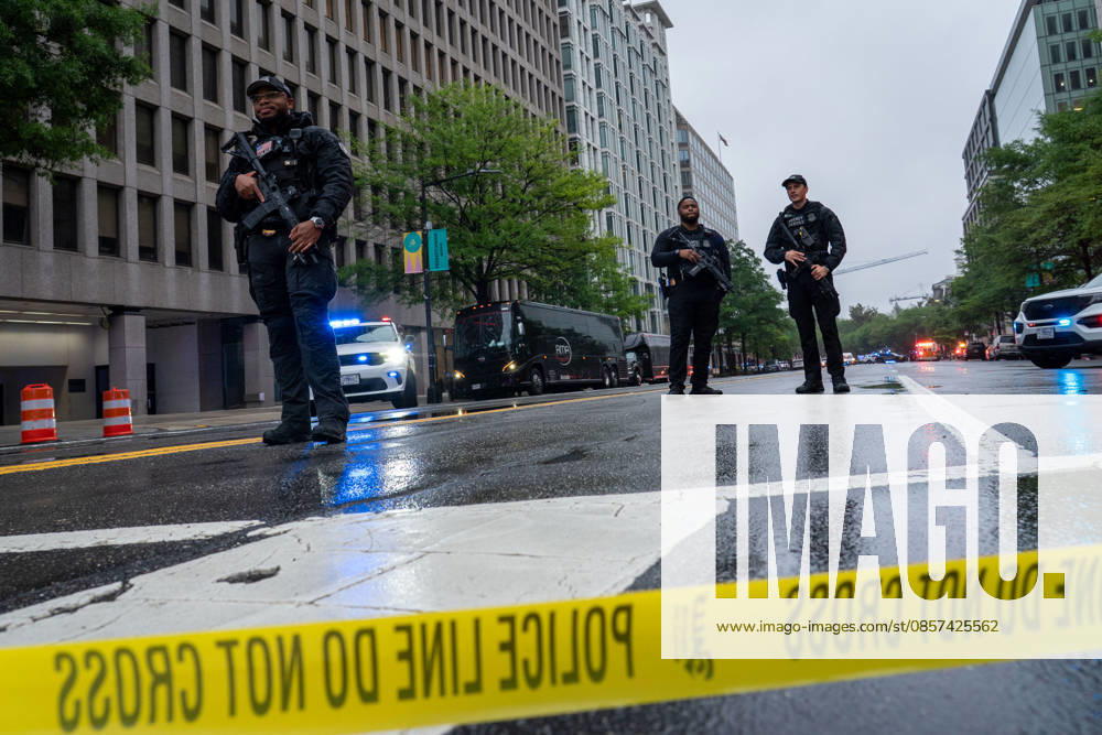 Secret Service police officers stand guard near the site where a gunman fired a volley of shots near the White House before being shot and fatally wounded by Secret Service officers. Another person was injured, according to law enforcement officials. Washington, DC, May 23, 2026. Photo: Zuma Press Washington USA - ZUMAmj3_ 20260523_zaf_mj3_009
