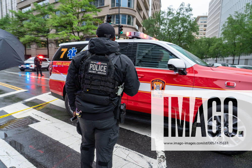 An emergency vehicle leaves the scene where a gunman fired a volley of shots near the White House before being shot and fatally wounded by U.S. Secret Service police officers, while another person was injured, according to law enforcement officials. Washington, DC, May 23, 2026. Photo: Zuma Press Washington USA - ZUMAmj3_ 20260523_zaf_mj3_001