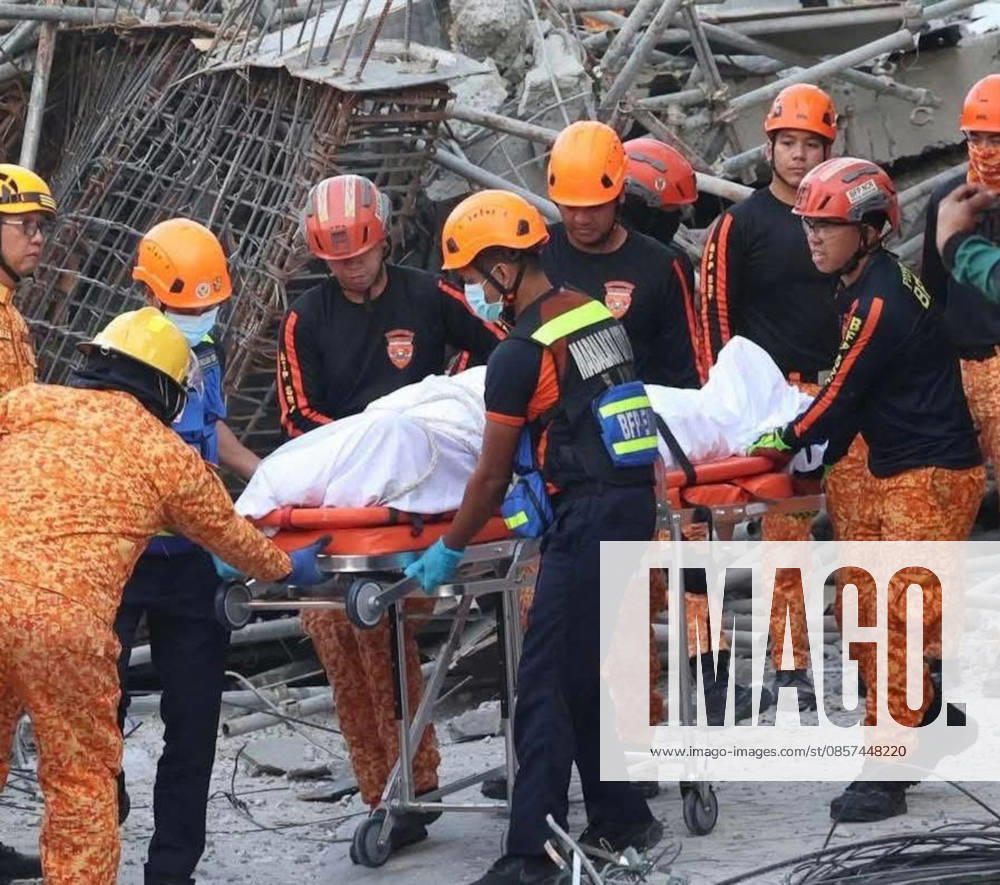 Building collapsed in Philippines, trapping multiple people, killing at least one ANGELES, PAMPANGA PROVINCE, PHILIPPINES - MAY 24: (---- - MANDATORY CREDIT - BUREAU OF FIRE PROTECTION (BFP) HANDOUT - NO MARKETING NO ADVERTISING CAMPAIGNS - DISTRIBUTED AS A SERVICE TO CLIENTS----) (EDITORS NOTE: Image depicts death) A body of a Malaysian national was recovered from the rubble of a building after it collapsed, in Angeles, Pampanga Province, Philippines, on May 24, 2026. One Malaysian national has been found dead, at least 24 were rescued alive and at least 21 are still missing, after the nine-storey building that was under construction collapsed, according to the local authorities. Search and rescue efforts are still un