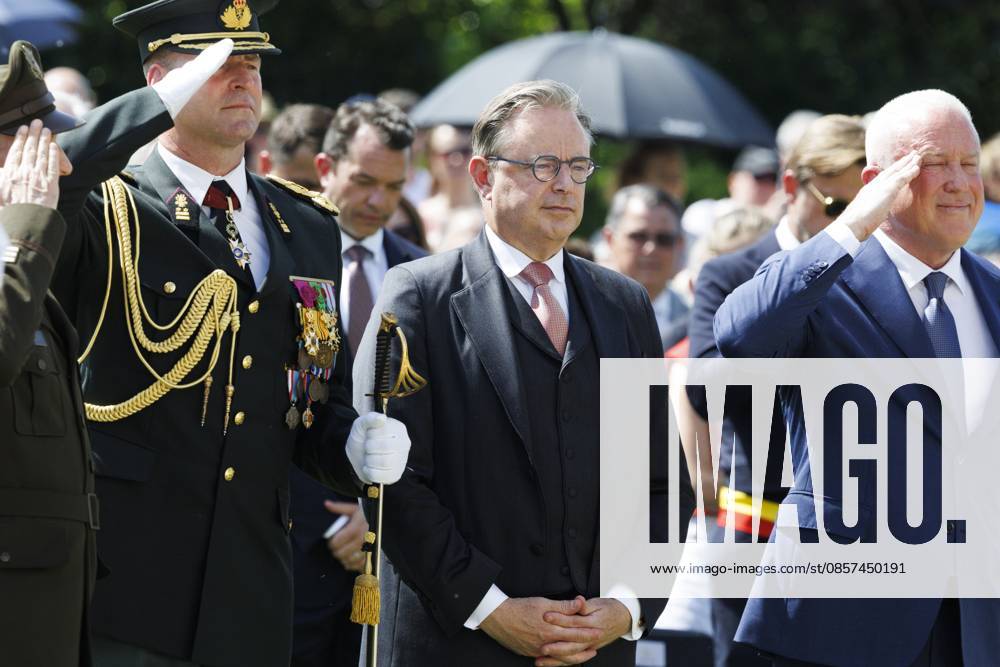 The representative of the King, Prime Minister Bart De Wever and US ambassador to Belgium Bill White pictured during the annual Memorial Day ceremony at the Flanders Field American Cemetery, in Waregem, Sunday 24 May 2026. NICOLASxMAETERLINCK 174928955