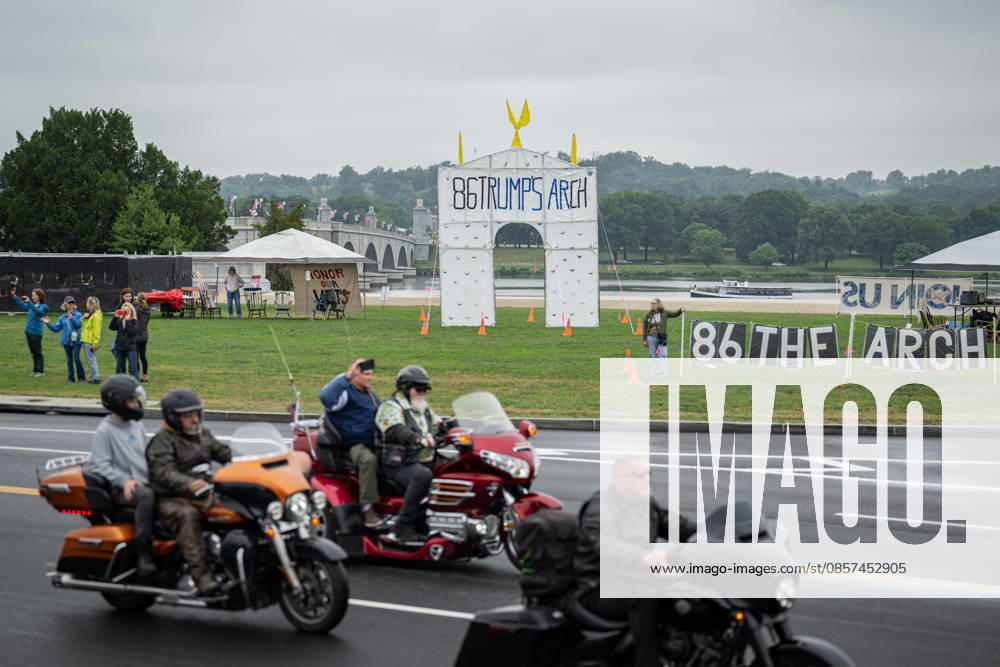 Motorcyclists take part in the Rolling to Remember memorial ride as anti-Trump signage is displayed near Arlington Memorial Bridge in Washington, D.C., during Memorial Day weekend. Washignton United States - ZUMAk206 20260524_znp_k206_010