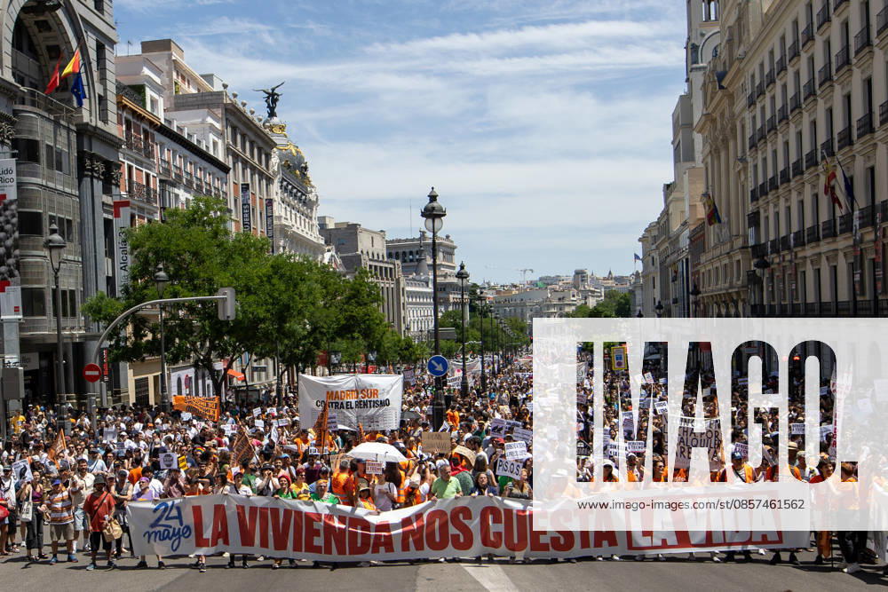 Overview of a pro-housing demonstration in the center of Madrid under the slogan Housing costs us our lives. Thousands of people participate in a demonstration under the slogan Housing costs us our lives to protest the machine of impoverishment and displacement that housing has become in Spain. Madrid Spain - ZUMAs197 20260524_aaa_s197_052