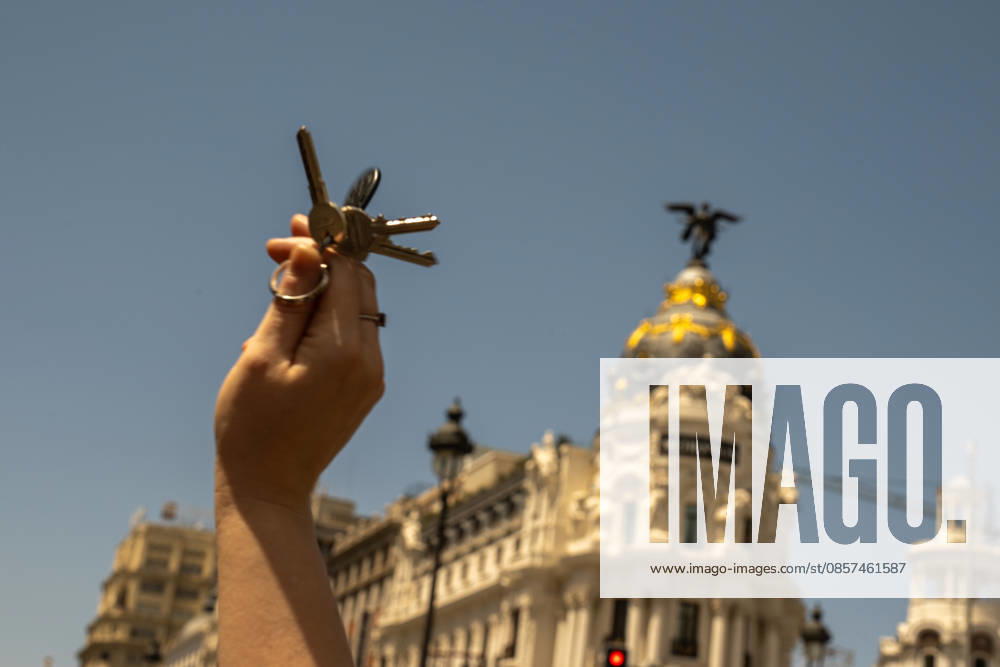 A protester holds up a bunch of keys during a pro-housing demonstration. Thousands of people participate in a demonstration under the slogan Housing costs us our lives to protest the machine of impoverishment and displacement that housing has become in Spain. Madrid Spain - ZUMAs197 20260524_aaa_s197_055