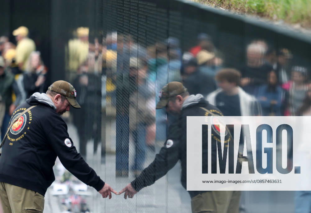 Visitors try to find the names of their relatives at the Vietnam Veterans Memorial following the Rolling to Remember ride over Memorial Day weekend in Washington, DC, USA, on May 24, 2026. The Rolling to Remember tradition has been active for 38 years, honouring fallen service members, prisoners of war, and those still missing in action during Memorial Day weekend. Washington USA - ZUMAs337 20260524_znp_s337_042