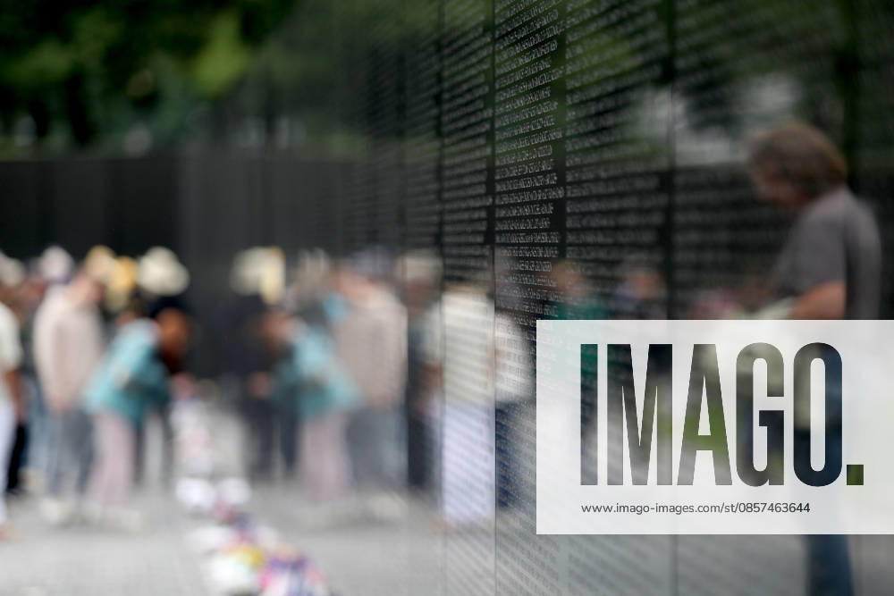 Visitors are reflected at the Vietnam Veterans Memorial following the Rolling to Remember ride over Memorial Day weekend in Washington, DC, USA, on May 24, 2026. The Rolling to Remember tradition has been active for 38 years, honouring fallen service members, prisoners of war, and those still missing in action during Memorial Day weekend. Washington USA - ZUMAs337 20260524_znp_s337_043
