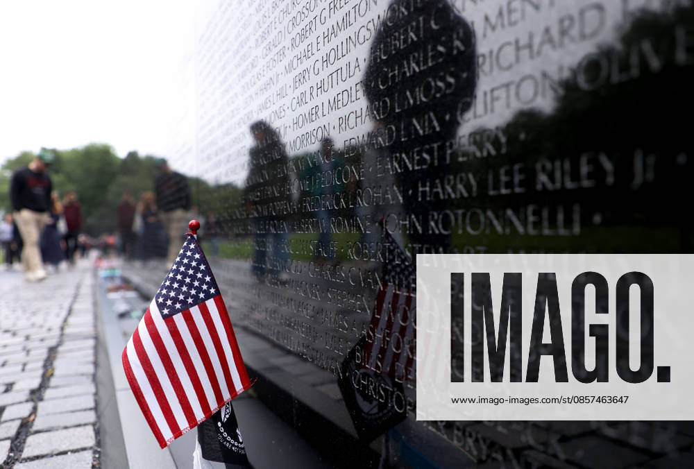 Visitors are reflected at the Vietnam Veterans Memorial following the Rolling to Remember ride over Memorial Day weekend in Washington, DC, USA, on May 24, 2026. The Rolling to Remember tradition has been active for 38 years, honouring fallen service members, prisoners of war, and those still missing in action during Memorial Day weekend. Washington USA - ZUMAs337 20260524_znp_s337_044