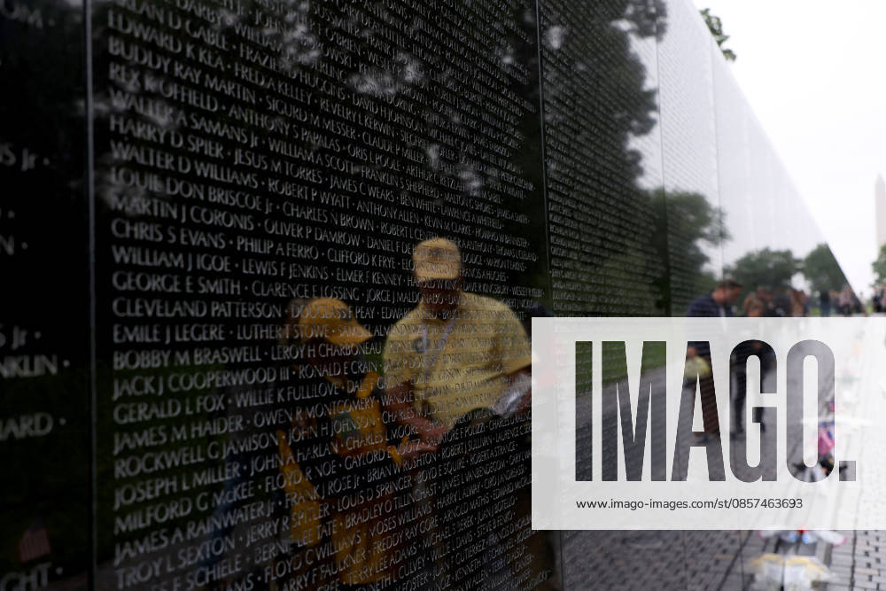Visitors are reflected at the Vietnam Veterans Memorial following the Rolling to Remember ride over Memorial Day weekend in Washington, DC, USA, on May 24, 2026. The Rolling to Remember tradition has been active for 38 years, honouring fallen service members, prisoners of war, and those still missing in action during Memorial Day weekend. Washington USA - ZUMAs337 20260524_znp_s337_049