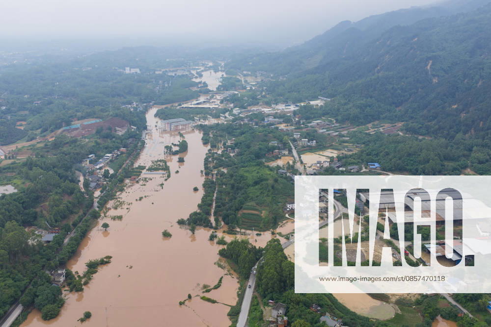 Aerial view of flooded Anxi Village after extreme rainfalls trigger flash floods and geological disasters on May 24, 2026 in Yongchuan District, Chongqing City, China. Devastating rainstorms struck parts of Southwest China s Chongqing over the weekend, resulting in multiple casualties and missing people in the municipality s Yongchuan and Beibei districts. Rescue efforts are ongoing. As of 2:30 pm on May 24, local authorities reported three deaths and 17 people missing in Yongchuan, with another two people missing in Beibei.