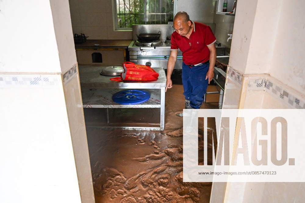 A large amount of mud silts up in a villager s house after extreme rainfalls trigger flash floods and geological disasters on May 24, 2026 in Yongchuan District, Chongqing City, China. Devastating rainstorms struck parts of Southwest China s Chongqing over the weekend, resulting in multiple casualties and missing people in the municipality s Yongchuan and Beibei districts. Rescue efforts are ongoing. As of 2:30 pm on May 24, local authorities reported three deaths and 17 people missing in Yongchuan, with another two people missing in Beibei.