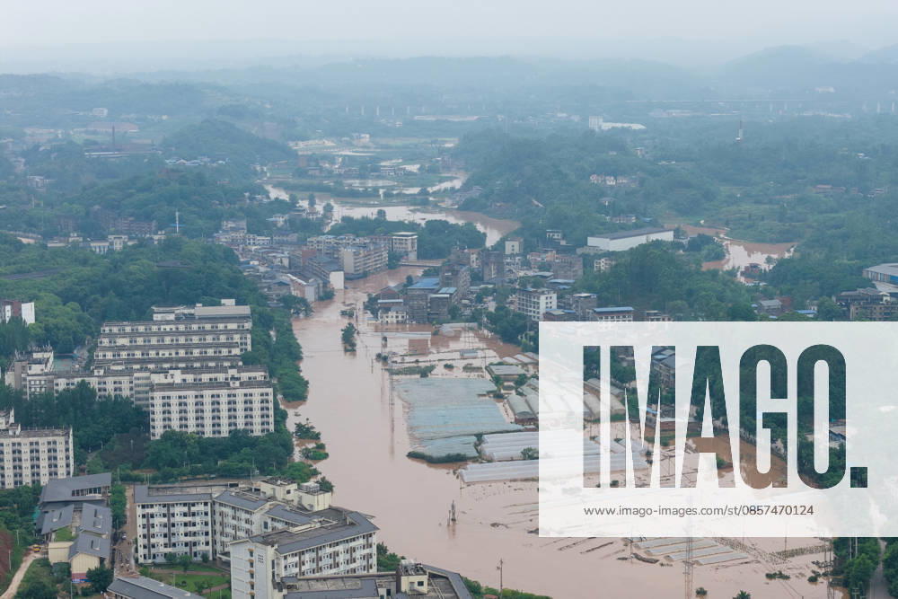 Rows of greenhouses are submerged after extreme rainfalls trigger flash floods and geological disasters on May 24, 2026 in Yongchuan District, Chongqing City, China. Devastating rainstorms struck parts of Southwest China s Chongqing over the weekend, resulting in multiple casualties and missing people in the municipality s Yongchuan and Beibei districts. Rescue efforts are ongoing. As of 2:30 pm on May 24, local authorities reported three deaths and 17 people missing in Yongchuan, with another two people missing in Beibei.