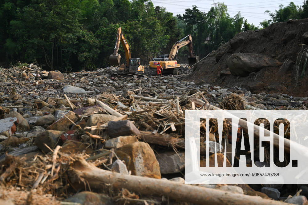 Rescue workers carry out search and rescue operations after extreme rainfalls trigger flash floods and geological disasters on May 24, 2026 in Yongchuan District, Chongqing City, China. Devastating rainstorms struck parts of Southwest China s Chongqing over the weekend, resulting in multiple casualties and missing people in the municipality s Yongchuan and Beibei districts. Rescue efforts are ongoing. As of 2:30 pm on May 24, local authorities reported three deaths and 17 people missing in Yongchuan, with another two people missing in Beibei.