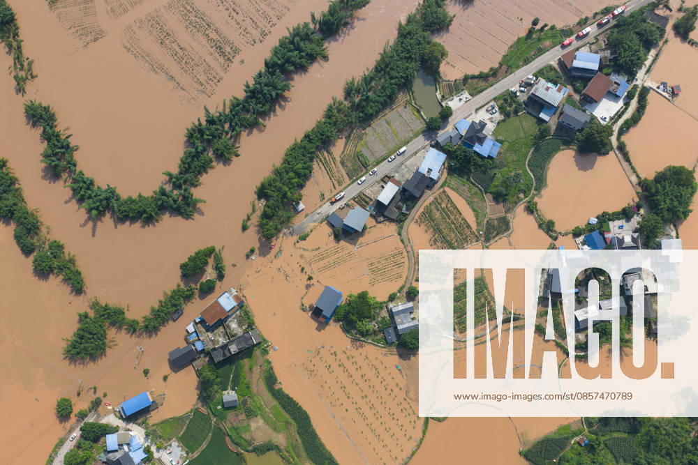 Aerial view of flooded Anxi Village after extreme rainfalls trigger flash floods and geological disasters on May 24, 2026 in Yongchuan District, Chongqing City, China. Devastating rainstorms struck parts of Southwest China s Chongqing over the weekend, resulting in multiple casualties and missing people in the municipality s Yongchuan and Beibei districts. Rescue efforts are ongoing. As of 2:30 pm on May 24, local authorities reported three deaths and 17 people missing in Yongchuan, with another two people missing in Beibei.