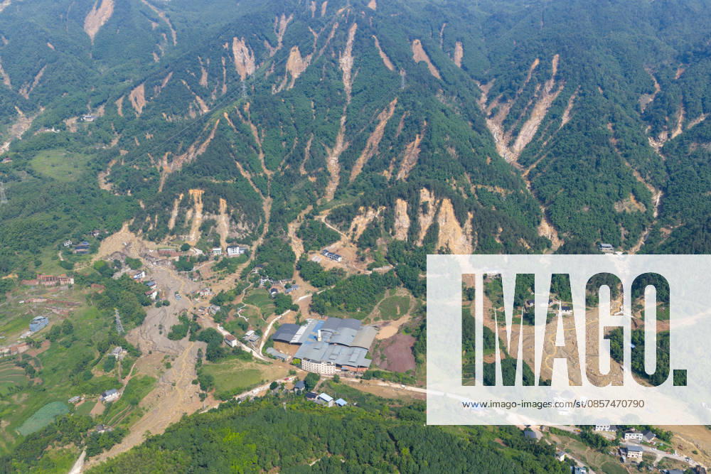 Aerial view of Anxi Village after extreme rainfalls trigger flash floods and geological disasters on May 24, 2026 in Yongchuan District, Chongqing City, China. Devastating rainstorms struck parts of Southwest China s Chongqing over the weekend, resulting in multiple casualties and missing people in the municipality s Yongchuan and Beibei districts. Rescue efforts are ongoing. As of 2:30 pm on May 24, local authorities reported three deaths and 17 people missing in Yongchuan, with another two people missing in Beibei.