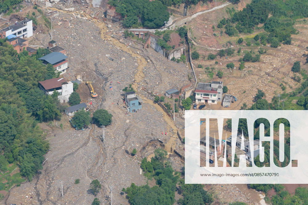In an aerial view, rescue workers carry out search and rescue operations after extreme rainfalls trigger flash floods and geological disasters on May 24, 2026 in Yongchuan District, Chongqing City, China. Devastating rainstorms struck parts of Southwest China s Chongqing over the weekend, resulting in multiple casualties and missing people in the municipality s Yongchuan and Beibei districts. Rescue efforts are ongoing. As of 2:30 pm on May 24, local authorities reported three deaths and 17 people missing in Yongchuan, with another two people missing in Beibei.