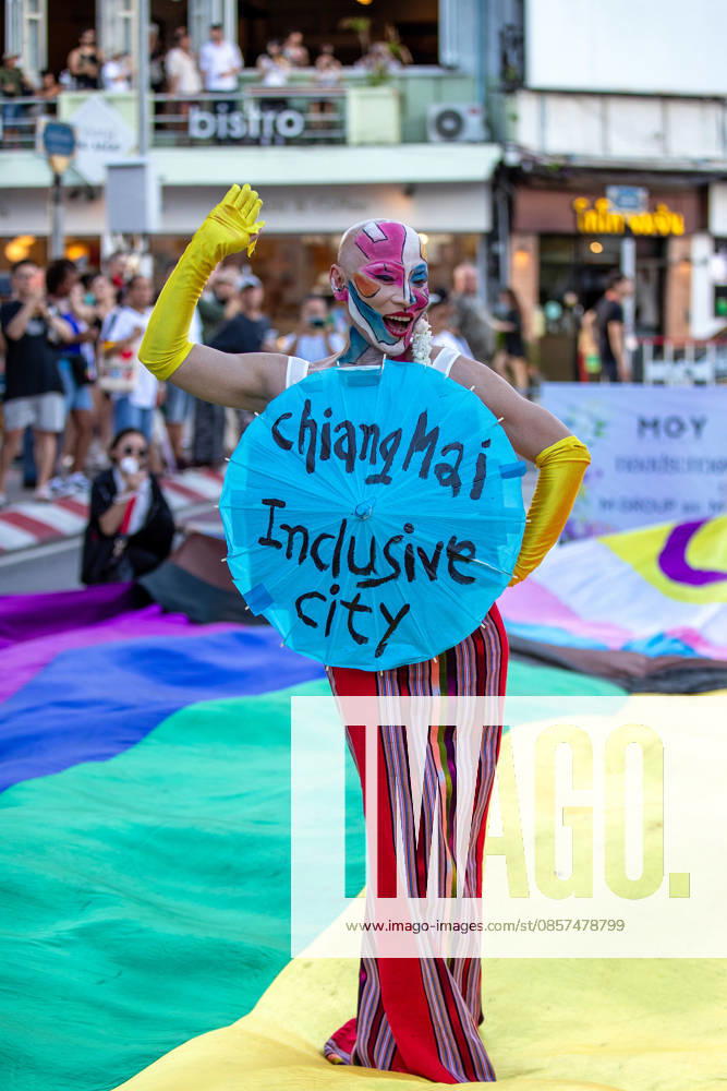 Sirisak Chaited, representative of the Chiang Mai Pride organizing committee, poses on a large rainbow flag during the Chiang Mai Pride Parade. The Chiang Mai Pride Parade 2026 took place in Chiang Mai, Thailand. Chiang Mai province holds Thailandis first Pride Month celebrations annually, promoting gender equality, diversity, and human rights as part of Pride Month activities in northern Thailand. Chiang Mai Thailand - ZUMAs197 20260524_aaa_s197_114