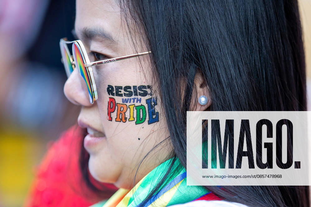A participant with a ìResist with Pridei face sticker attends The Chiang Mai Pride Parade 2026 celebrations. The Chiang Mai Pride Parade 2026 took place in Chiang Mai, Thailand. Chiang Mai province holds Thailandis first Pride Month celebrations annually, promoting gender equality, diversity, and human rights as part of Pride Month activities in northern Thailand. Chiang Mai Thailand - ZUMAs197 20260524_aaa_s197_118