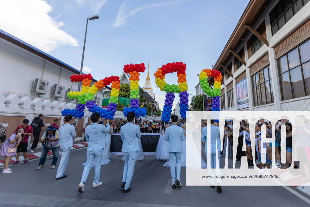 Participants carry rainbow-colored balloon letters spelling ìPRIDEi during The Chiang Mai Pride Parade 2026 celebrations. The Chiang Mai Pride Parade 2026 took place in Chiang Mai, Thailand. Chiang Mai province holds Thailandis first Pride Month celebrations annually, promoting gender equality, diversity, and human rights as part of Pride Month activities in northern Thailand. Chiang Mai Thailand - ZUMAs197 20260524_aaa_s197_145