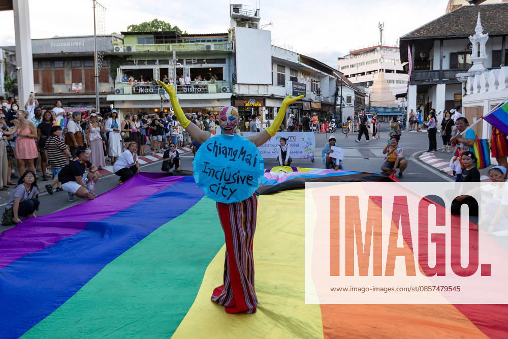 Sirisak Chaited, representative of the Chiang Mai Pride organizing committee, poses on a large rainbow flag during the Chiang Mai Pride Parade. The Chiang Mai Pride Parade 2026 took place in Chiang Mai, Thailand. Chiang Mai province holds Thailandis first Pride Month celebrations annually, promoting gender equality, diversity, and human rights as part of Pride Month activities in northern Thailand. Chiang Mai Thailand - ZUMAs197 20260524_aaa_s197_147