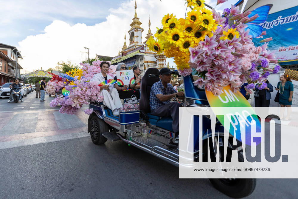 Participants ride on a flower-decorated Tuk Tuk vehicle during The Chiang Mai Pride Parade 2026 celebrations. The Chiang Mai Pride Parade 2026 took place in Chiang Mai, Thailand. Chiang Mai province holds Thailandis first Pride Month celebrations annually, promoting gender equality, diversity, and human rights as part of Pride Month activities in northern Thailand. Chiang Mai Thailand - ZUMAs197 20260524_aaa_s197_139