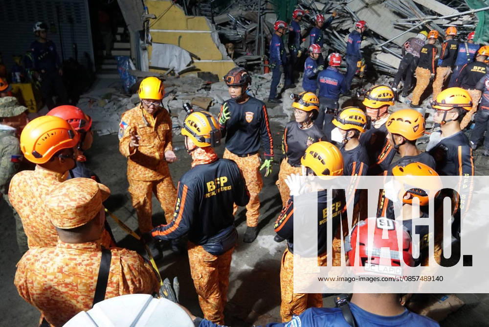 (260525) -- MANILA, May 25, 2026 -- Rescuers search for survivors at the site of a collapsed building in Angeles City, Pampanga province, the Philippines, May 24, 2026. Four people were confirmed dead after a building collapsed before dawn Sunday in Angeles City in northern Philippines Pampanga province, as search and rescue operations continue for 17 missing people, authorities said Monday. ( Handout via Xinhua) (SpotNews) PHILIPPINES-PAMPANGA-ANGELES-BUILDING COLLAPSE BureauxofxFirexProtectionxCentralxLuzon