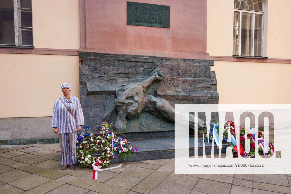 Opponent of reconciliation with Sudeten Germans, dressed in a Jewish prison uniform, standing by The Commemorative Plaque Anti-Fascist Fightersduring a commemorative ceremony honoring the victims of Nazism in Brno, Czech Republic, on May 25, 2026. The 76th Congress of Sudeten Germans took place in Brno, Czech Republic, from May 22 to 25, 2026, marking the first time the event was held in the country. Brno Czech Republic - ZUMAc315 20260525_zsp_c315_001