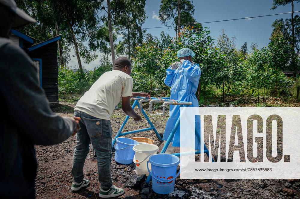 Ebola precautions continue in Democratic Republic of Congo GOMA, DEMOCRATIC REPUBLIC OF THE CONGO - MAY 25: Health workers carry out hand sanitizing, handwashing and temperature screening procedures for travelers at the Kanyaruchinya checkpoint near Goma as part of preventive measures against the Ebola virus in Goma, Democratic Republic of the Congo, on May 25, 2026. Stringer Anadolu Goma Democratic Republic of the Congo. Editorial use only. Please get in touch for any other usage.