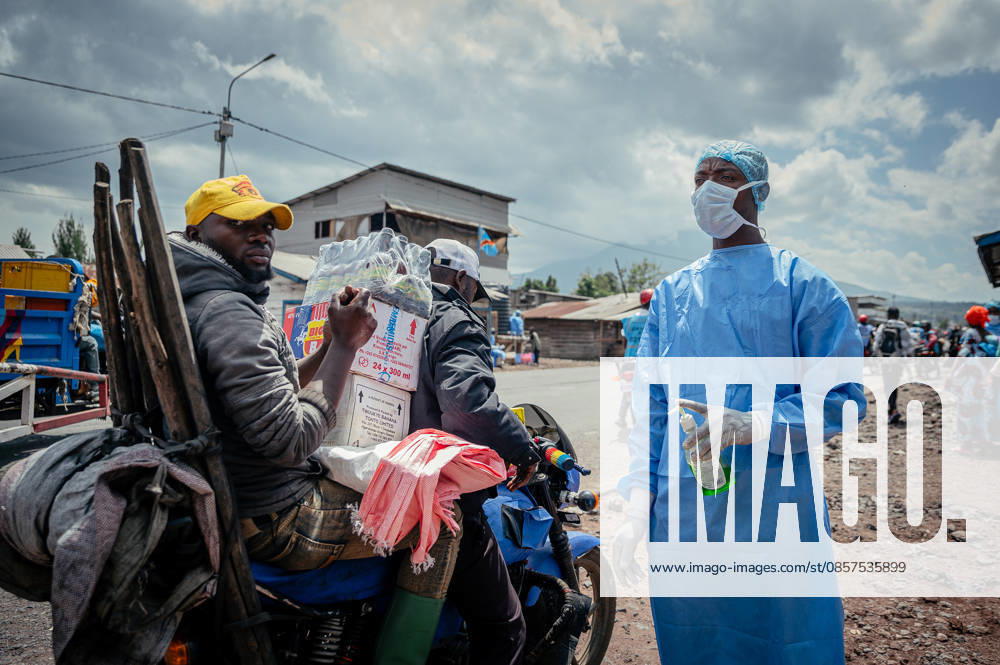 Ebola precautions continue in Democratic Republic of Congo GOMA, DEMOCRATIC REPUBLIC OF THE CONGO - MAY 25: Health workers carry out hand sanitizing, handwashing and temperature screening procedures for travelers at the Kanyaruchinya checkpoint near Goma as part of preventive measures against the Ebola virus in Goma, Democratic Republic of the Congo, on May 25, 2026. Stringer Anadolu Goma Democratic Republic of the Congo. Editorial use only. Please get in touch for any other usage.