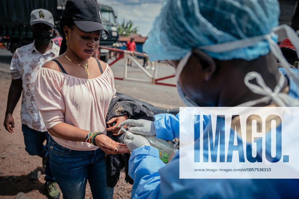 Ebola precautions continue in Democratic Republic of Congo GOMA, DEMOCRATIC REPUBLIC OF THE CONGO - MAY 25: Health workers carry out hand sanitizing, handwashing and temperature screening procedures for travelers at the Kanyaruchinya checkpoint near Goma as part of preventive measures against the Ebola virus in Goma, Democratic Republic of the Congo, on May 25, 2026. Stringer Anadolu Goma Democratic Republic of the Congo. Editorial use only. Please get in touch for any other usage.
