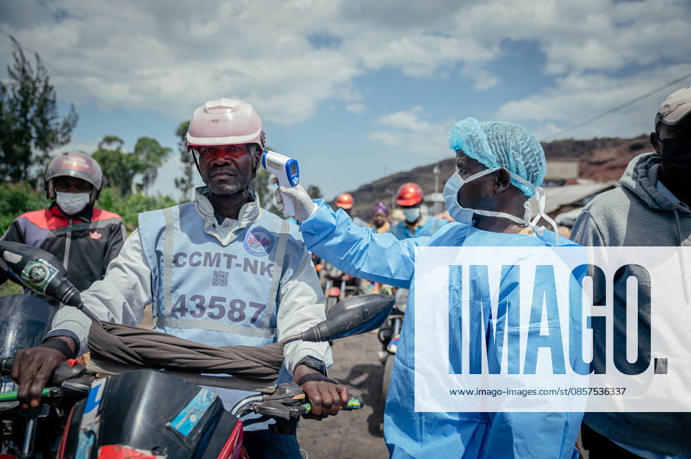 Ebola precautions continue in Democratic Republic of Congo GOMA, DEMOCRATIC REPUBLIC OF THE CONGO - MAY 25: Health workers carry out hand sanitizing, handwashing and temperature screening procedures for travelers at the Kanyaruchinya checkpoint near Goma as part of preventive measures against the Ebola virus in Goma, Democratic Republic of the Congo, on May 25, 2026. Stringer Anadolu Goma Democratic Republic of the Congo. Editorial use only. Please get in touch for any other usage.