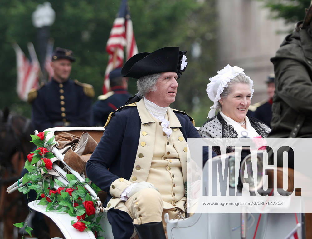 Participants dressed as former first lady Martha Washington and former US President George Washington take part in the National Memorial Day Parade on Constitution Avenue in Washington, DC, USA, on May 25, 2026. The parade has been held annually since 2005, marking its 21st anniversary. Washington USA - ZUMAs337 20260525_znp_s337_002