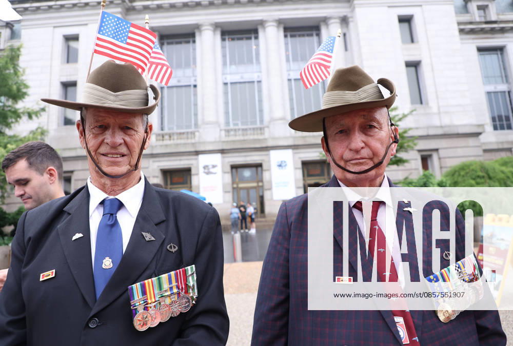 National Memorial Day Parade in Washington DC, USA. Veterans with American flags watch the National Memorial Day Parade on Constitution Avenue in Washington, DC, USA, on May 25, 2026. The parade has been held annually since 2005, marking its 21st anniversary. Washington USA