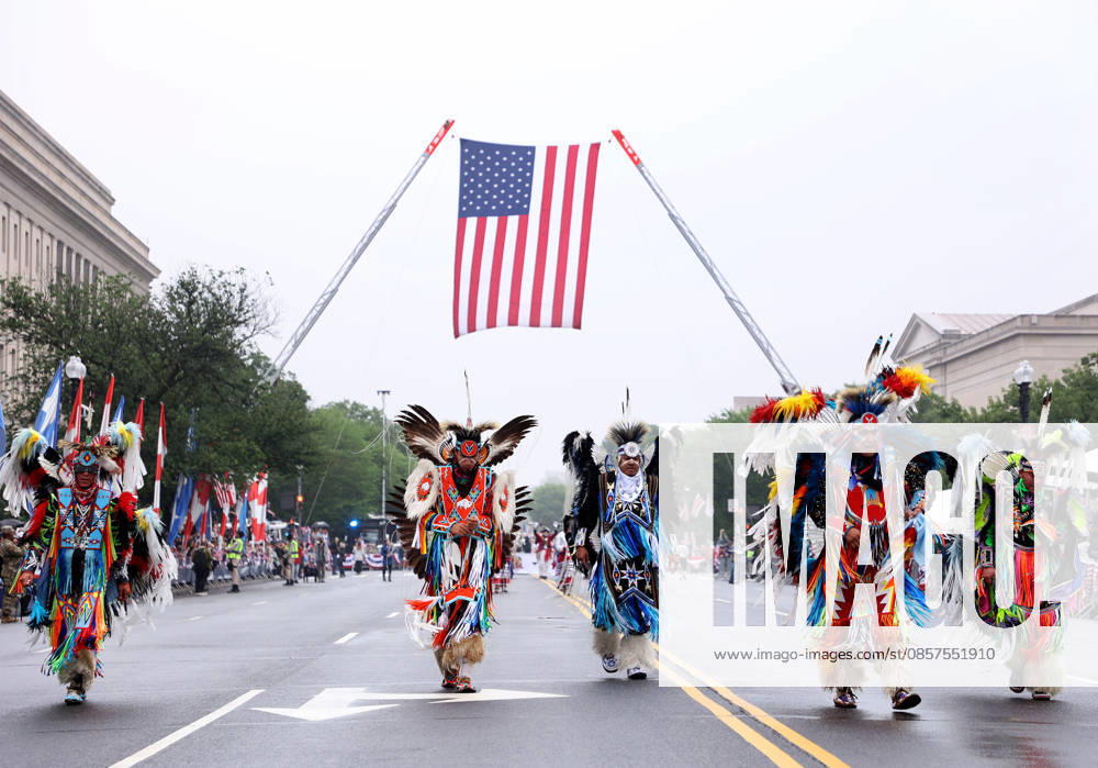 National Memorial Day Parade in Washington DC, USA. Participants dressed in Native American ceremonial attire take part in the National Memorial Day Parade on Constitution Avenue in Washington, DC, USA, on May 25, 2026. The parade has been held annually since 2005, marking its 21st anniversary. Washington USA