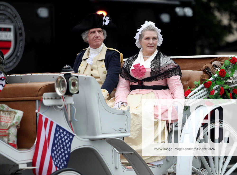 National Memorial Day Parade in Washington DC, USA. Participants dressed as former first lady Martha Washington and former US President George Washington take part in the National Memorial Day Parade on Constitution Avenue in Washington, DC, USA, on May 25, 2026. The parade has been held annually since 2005, marking its 21st anniversary. Washington USA