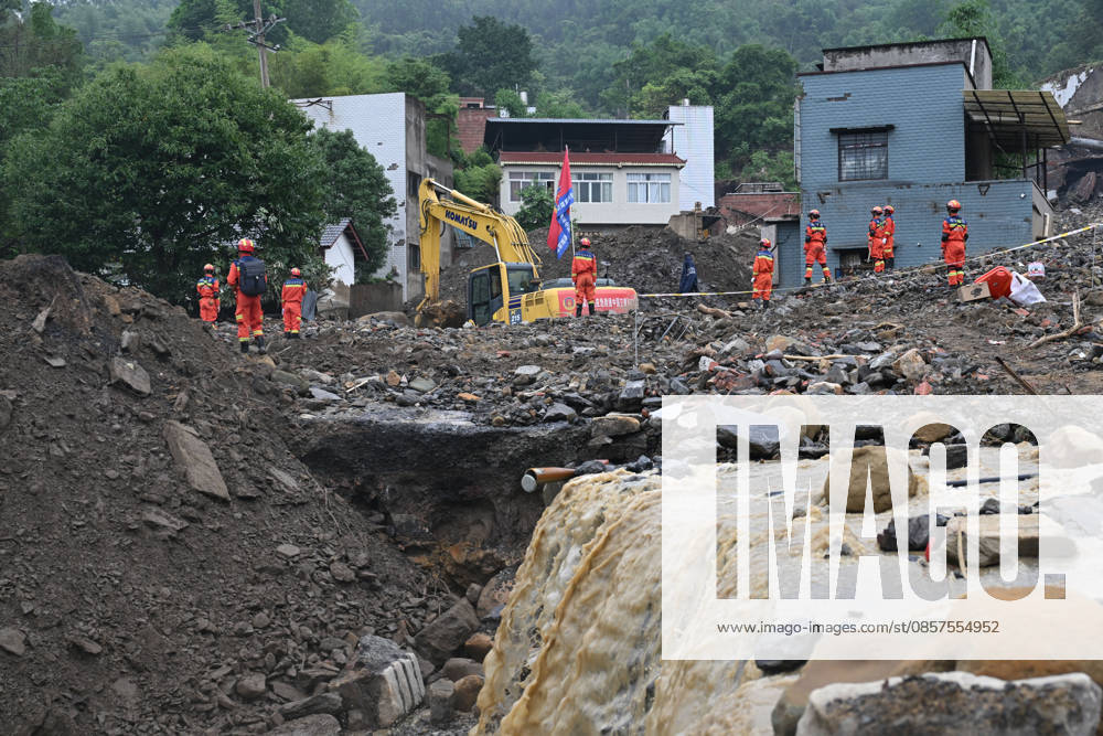 Rescuers carry out search and rescue work at the disaster-hit area after a heavy rainstorm hit Yongchuan District on May 25, 2026 in Chongqing, China. Record-breaking torrential rain battered Yongchuan District in southwest China s Chongqing Municipality from late May 23 to May 24, triggering flash floods, landslides and mudslides. Rescue operations are still underway as multiple towns and subdistricts suffered severe damage.
