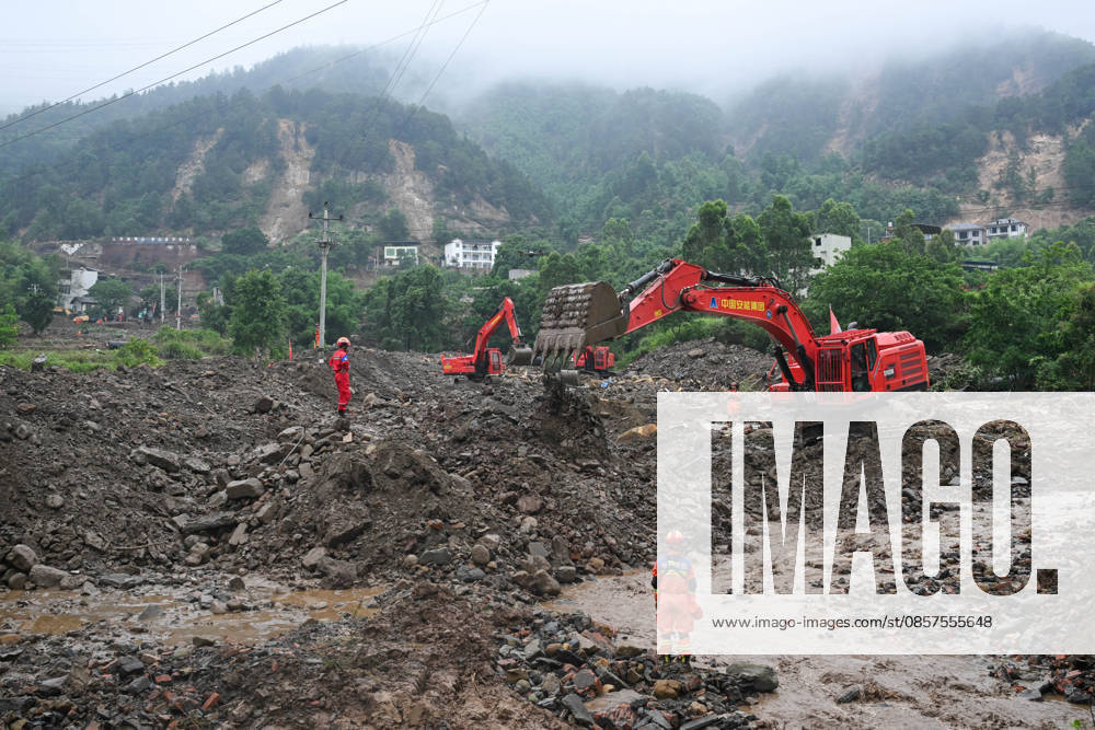Rescuers carry out search and rescue work at the disaster-hit area after a heavy rainstorm hit Yongchuan District on May 25, 2026 in Chongqing, China. Record-breaking torrential rain battered Yongchuan District in southwest China s Chongqing Municipality from late May 23 to May 24, triggering flash floods, landslides and mudslides. Rescue operations are still underway as multiple towns and subdistricts suffered severe damage.