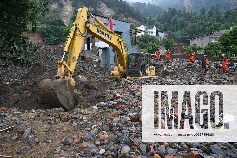 Rescuers carry out search and rescue work at the disaster-hit area after a heavy rainstorm hit Yongchuan District on May 25, 2026 in Chongqing, China. Record-breaking torrential rain battered Yongchuan District in southwest China s Chongqing Municipality from late May 23 to May 24, triggering flash floods, landslides and mudslides. Rescue operations are still underway as multiple towns and subdistricts suffered severe damage.
