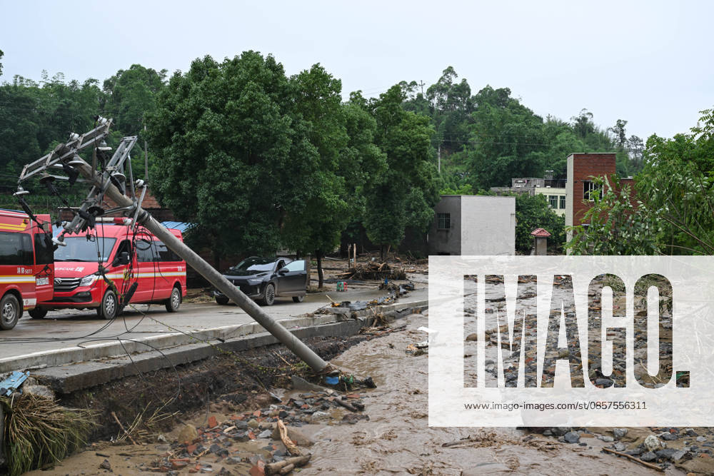 A broken electrical pole is seen at disaster-hit Anxi Village after a heavy rainstorm hit Yongchuan District on May 25, 2026 in Chongqing, China. Record-breaking torrential rain battered Yongchuan District in southwest China s Chongqing Municipality from late May 23 to May 24, triggering flash floods, landslides and mudslides. Rescue operations are still underway as multiple towns and subdistricts suffered severe damage.