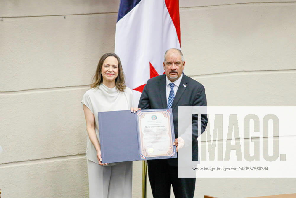 Maria Corina Machado visits Panama PANAMA CITY, PANAMA - MAY 25: Venezuelan opposition leader and winner of the Nobel Peace Prize Maria Corina Machado receives an achievement award from the President of the National Assembly of Panama Jorge Herrera (R) at the National Assembly in Panama City, Panama on May 25, 2026. Machado who is announced her candidacy for the presidency of Venezuela, is visiting Panama as part of a regional tour, during which she is set to meet with members of the Venezuelan diaspora and Panamanian President Jose Raul Mulino. Daniel Gonzalez Anadolu Panama City Panama. Editorial use only. Please get in touch for any other usage.