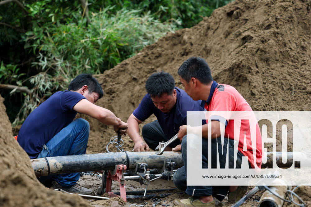 (260526) -- CHONGQING, May 26, 2026 -- Staff members repair tap water pipes at Yongchuan District of southwest China s Chongqing Municipality, May 26, 2026. From Saturday night to early Sunday morning, a sudden and extreme catastrophic rainstorm struck Yongchuan, triggering flash floods and geological disasters in multiple areas of this district. After the disaster occurred, the local authorities immediately activated the emergency response mechanism, coordinated rescue forces from all sides and made every effort to carry out rescue operations and infrastructure restoration. Rescue and response efforts are still underway. ) CHINA-CHONGQING-FLOOD-RESCUE (CN) HuangxWei
