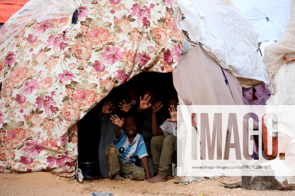 Camps turn into permanent settlements amid ongoing crisis in Somalia MOGADISHU, SOMALIA - MAY 26: Children wave form a tent as millions of people living in camps that have gradually turned into permanent settlements, where they continue to face difficult living conditions amid insecurity, conflict and drought in the capital Mogadishu, Somalia, on May 26, 2026. Metin Yuksel Kaya Anadolu Mogadishu Somalia. Editorial use only. Please get in touch for any other usage.
