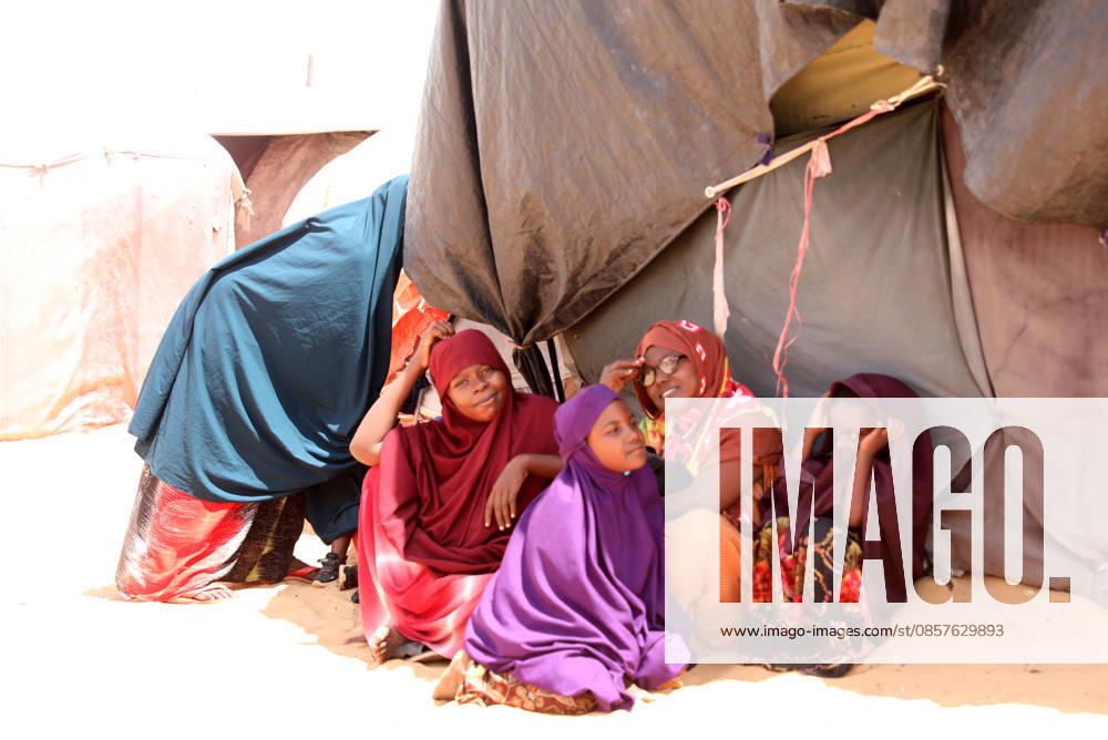 Camps turn into permanent settlements amid ongoing crisis in Somalia MOGADISHU, SOMALIA - MAY 26: Children are seen next to a tens as millions of people living in camps that have gradually turned into permanent settlements, where they continue to face difficult living conditions amid insecurity, conflict and drought in the capital Mogadishu, Somalia, on May 26, 2026. Metin Yuksel Kaya Anadolu Mogadishu Somalia. Editorial use only. Please get in touch for any other usage.