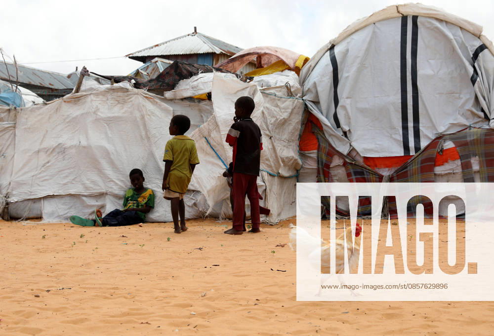 Camps turn into permanent settlements amid ongoing crisis in Somalia MOGADISHU, SOMALIA - MAY 26: Children are seen in front of tents as millions of people living in camps that have gradually turned into permanent settlements, where they continue to face difficult living conditions amid insecurity, conflict and drought in the capital Mogadishu, Somalia, on May 26, 2026. Metin Yuksel Kaya Anadolu Mogadishu Somalia. Editorial use only. Please get in touch for any other usage.