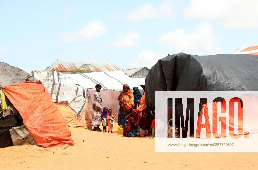 Camps turn into permanent settlements amid ongoing crisis in Somalia MOGADISHU, SOMALIA - MAY 26: Children are seen next to tents as millions of people living in camps that have gradually turned into permanent settlements, where they continue to face difficult living conditions amid insecurity, conflict and drought in the capital Mogadishu, Somalia, on May 26, 2026. Metin Yuksel Kaya Anadolu Mogadishu Somalia. Editorial use only. Please get in touch for any other usage.