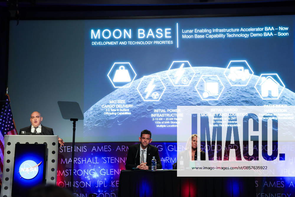 Joined onstage by NASA Administrator JARED ISAACMAN and LORI GLAZE, Acting Associate Administrator, Exploration Systems Development Mission Directorate, NASA, CARLOS GARCIA-GALAN, Program Executive, Moon Base, NASA, left at podium, speaks at a press conference announcing Moon Base plans and mission progress at NASA Headquarters in Washington, D.C. on May 26, 2026. NASA s Moon Base program is a long-term lunar exploration and infrastructure initiative designed to enable sustained human presence at the lunar South Pole. Washington USA - ZUMAd227 20260526_znp_d227_011