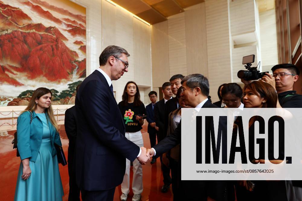 Serbian President Aleksandar Vucic (L) shakes hands with Li Zongyuan, curator of the Museum of the Communist Party of China, during a visit to the the Museum of the Communist Party of China (CPC) on May 26, 2026 in Beijing, China. Vucic is on a state visit to China.