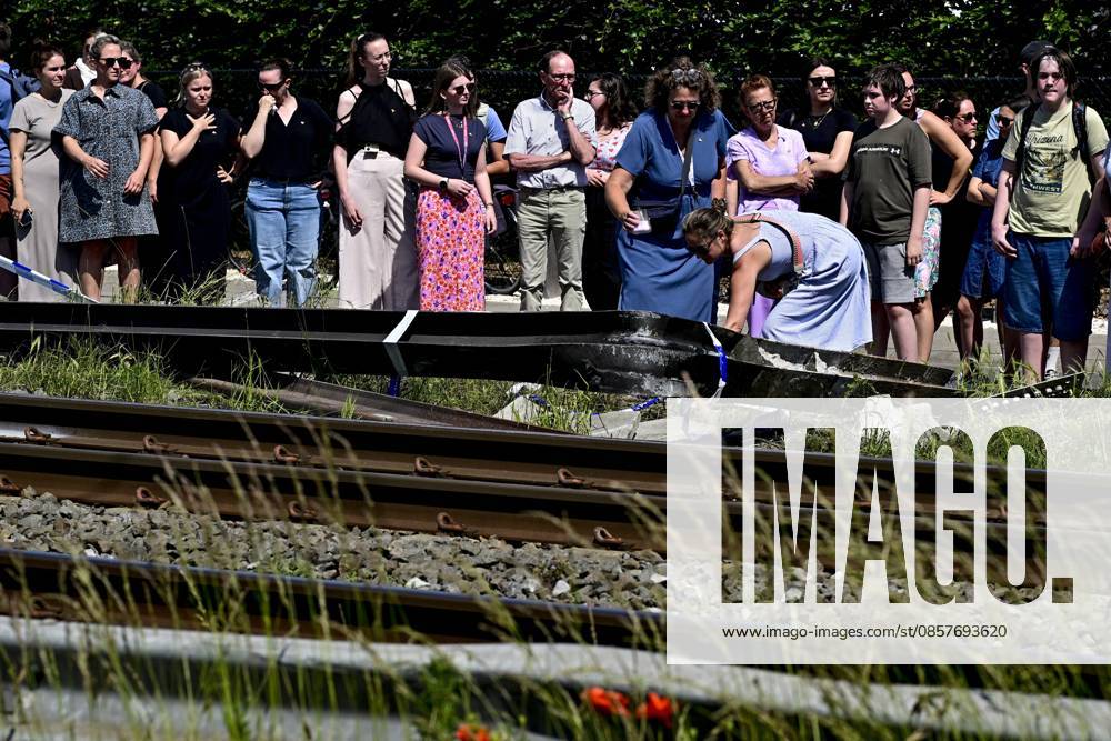People mourn and lay flowers at the spot of Tuesday s tragic train accident in Buggenhout, on Wednesday 27 May 2026. The accident happened around 8:15 am. Four people have been killed, the driver, two children and their supervisor. According to initial reports, the level crossing was closed at the time of the accident. DIRKxWAEM 175161917